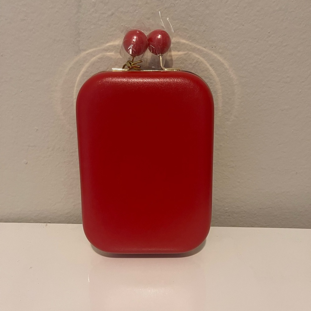 Estee Lauter red small handbag
